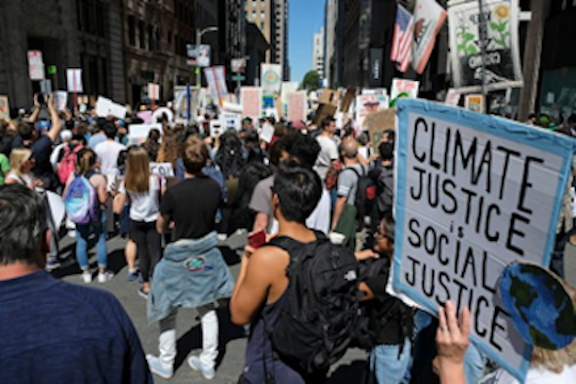 People march through San Francisco's Financial District during a climate protest on September 20, 2020. Eric Risberg, AP.