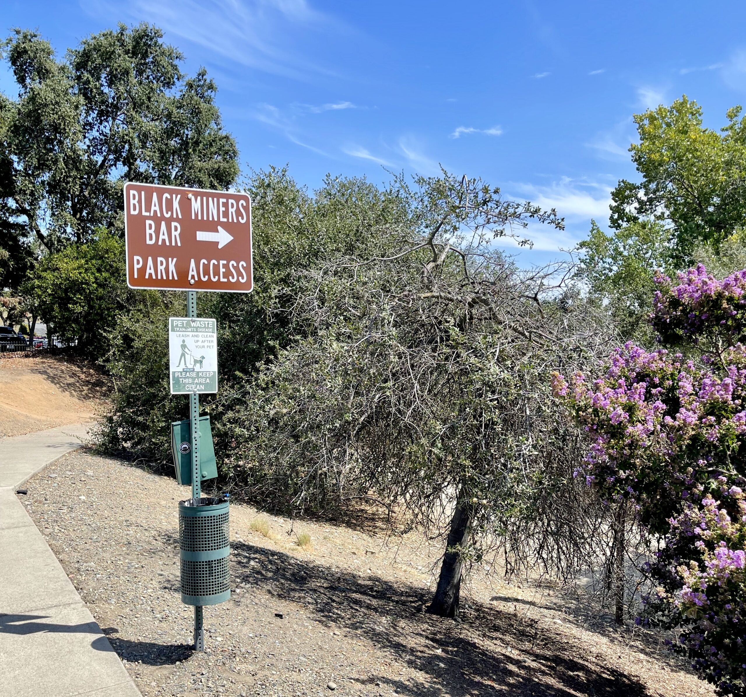 Street sign pointing the way to Black Miners Bar Park Access. Folsom Lake State Recreation Area.